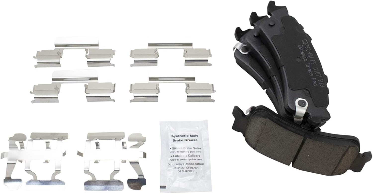 TRQ Performance Rear Brake Pad and Rotor Set Ceramic Coated Slotted Drilled Solid Rotors Calipers Compatible with 99-02 Chevrolet Silverado 1500 GMC Sierra 1500 00-01 Tahoe Yukon 03-05 Astro Safari
