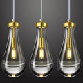 Raindrop Pendant Lights Kitchen Island Set of 3 Teardrop Gold Hanging Light Fixtures Clear Solid Glass Pendant Light Modern Chandeliers for Dining Room Porch Corridor Living Room…